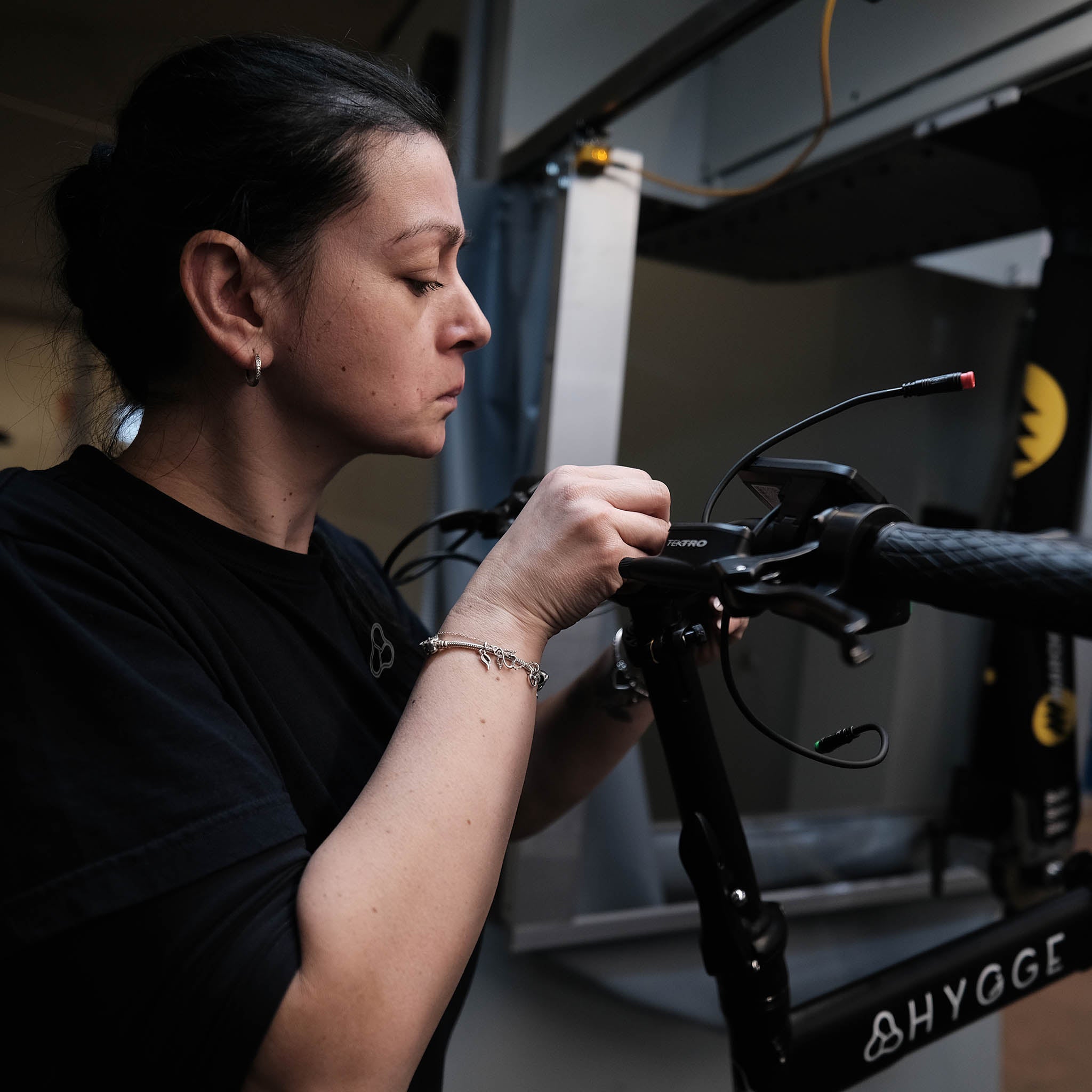 A technician repairing a Hygge e-bike, highlighting the brand’s nationwide repair and support service across the UK and EU